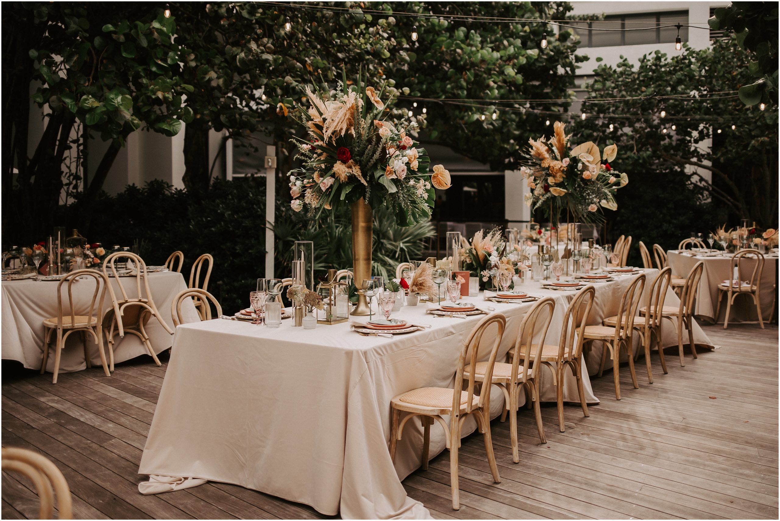 When it comes to a reception in paradise, we think you can never have too many tropical florals. As a result, the guest tables were covered in foliage and florals provided by Primrose Florals. 