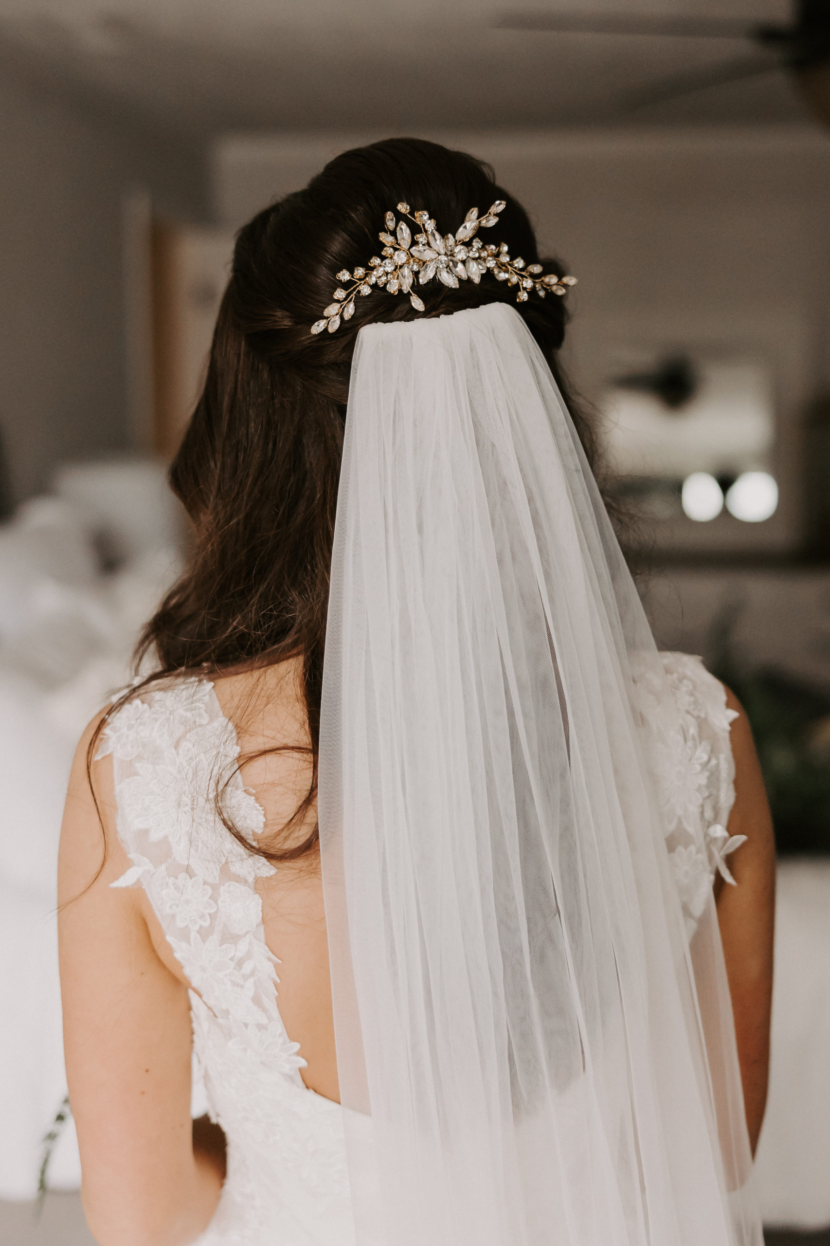 She completed her modern bridal look with a veil coupled with a head piece that gave the perfect finishing touch for  their intimate celebration.